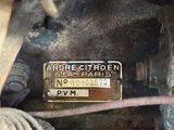 a close up of a license plate on a car ' s engine