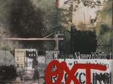 a picture of a picture of a building with graffiti on it