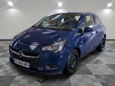 a picture of a blue car parked in a garage