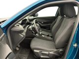 the interior of a blue car with the door open and the driver ' s seat up