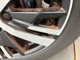 a close up of a tire that has been painted silver