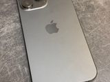 an apple iphone is sitting on top of a metal table