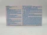 the back of a box of toothpaste sitting on a white surface