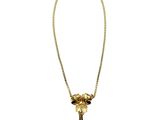 a gold necklace with a tassel hanging from it ' s end