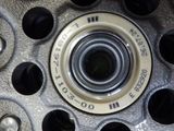 a close up of a wheel with a bearing on it