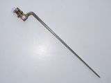 an old metal tool on a white surface with a white background