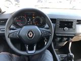the interior of a car with a steering wheel and dashboard controls