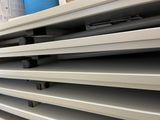 a shelf that has a bunch of books on it