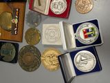 a lot of coins that are sitting on a table