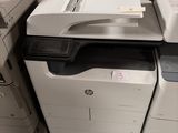 two printers and a printer sitting on top of each other