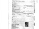 une image représentant une photo en noir et blanc d'un document sur lequel figure un cachet