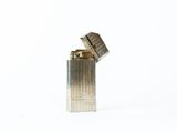 a lighter that is sitting on a white surface