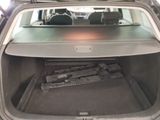 a trunk of a car with a bunch of wood in it