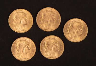 six souverains d'or représentant des têtes de femmes sur un fond noir