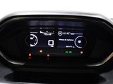 the dashboard of a motorcycle with a digital display in the center of it