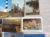 a lot of postcards that are on a table