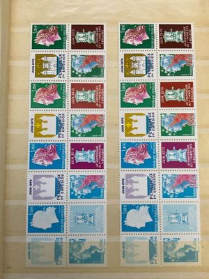 a close up of a picture of stamps on a wall