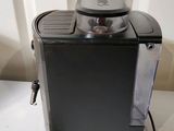 a coffee maker that is sitting on a table