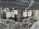 many rolls of black plastic wrapped in plastic