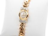 an image of a woman ' s wrist watch on a white pillow