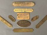 a lot of brass items that are on a table