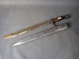 a knife and a knife holder on a table