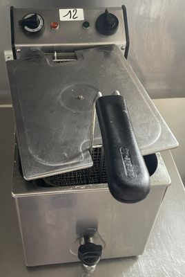 an image of a commercial deep fryer on a counter