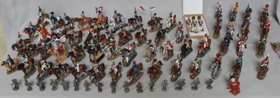 a lot of figurines that are on a table