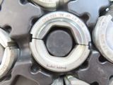 a close up of a bunch of metal gears on a table