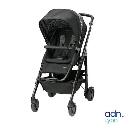 a black stroller with a black canopy and black wheels
