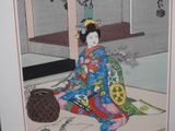 a picture of a woman in a kimono sitting on the floor