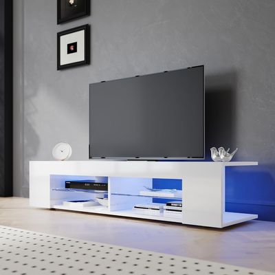 a white entertainment center with a tv on top of it
