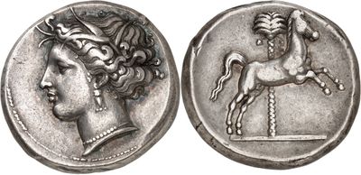 a silver coin with a horse and a woman on it