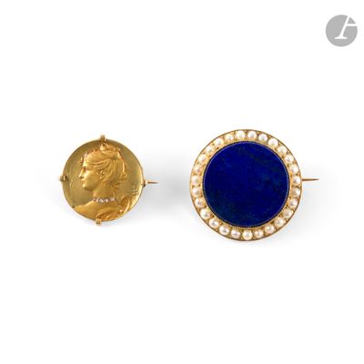 an image of a pair of gold and lapis earrings
