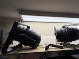 two lights that are sitting on a shelf in a room