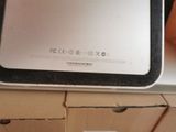 a laptop that is sitting on top of a box