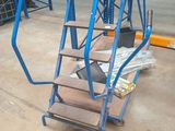 a picture of a ladder in a large warehouse