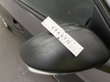 a sticker on the side mirror of a car