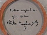a close up of a plate with writing on it