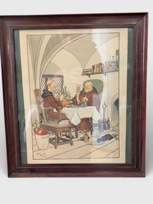 photo encadrée représentant un couple assis à une table devant une cheminée