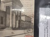 a picture of a postcard with a picture of a building on it