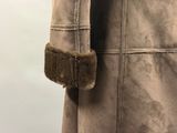 an image of a coat with a fur collar