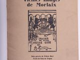 une image représentant un livre sur lequel figure l'illustration d'un château