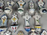 many different types of vases and bowls on the table