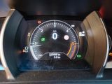 a close up of a car dashboard with a speedometer