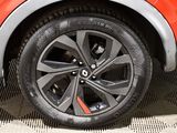 a close up of a tire on a car ' s rim