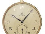 an image of an old pocket watch on a white background