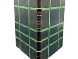 a black and green book with a green cover