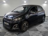 a picture of a small black car parked on a checkered floor