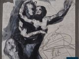 drawing of a man and a woman hugging each other on a piece of paper